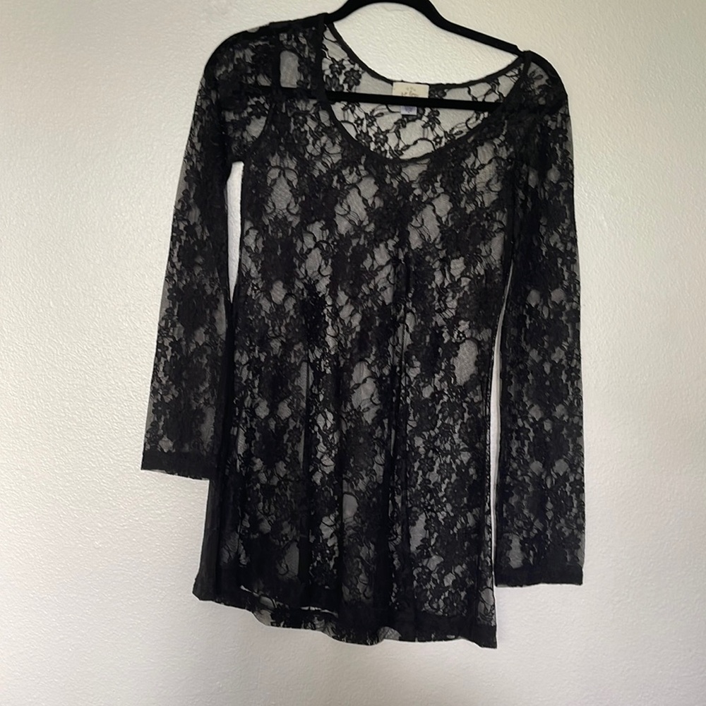 Black lace long sleeve top with swing hem by So Low